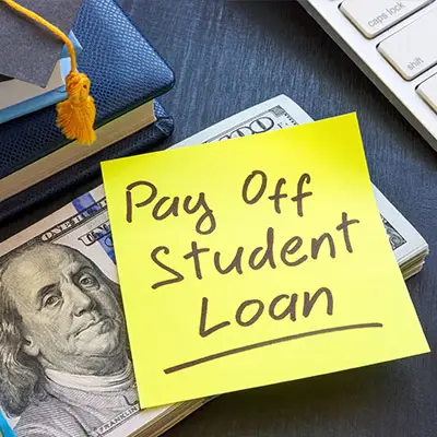 Image of post-it note to pay student loans